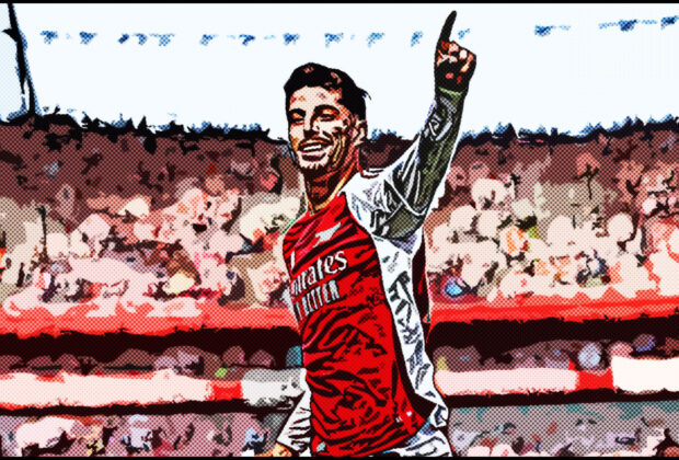 Kai Havertz celebrating passionately after scoring a goal at the Emirates Stadium, arm raised and a triumphant expression,